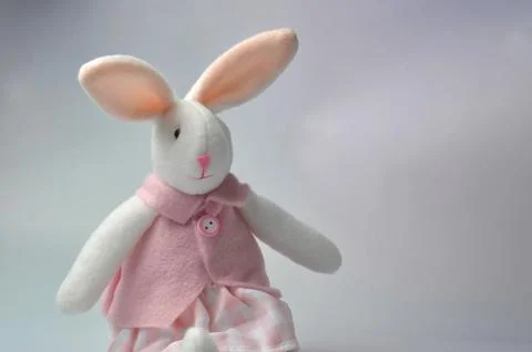 Plush hare on a gray background. New year 2023. Foto stock