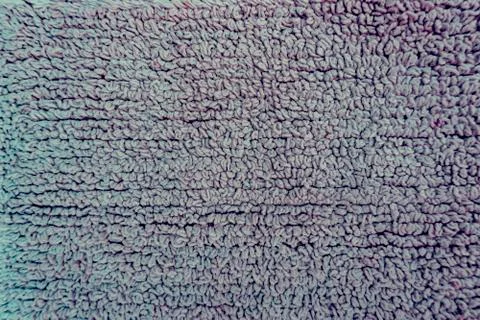 Plush texture from blue bathmat Stock Photos