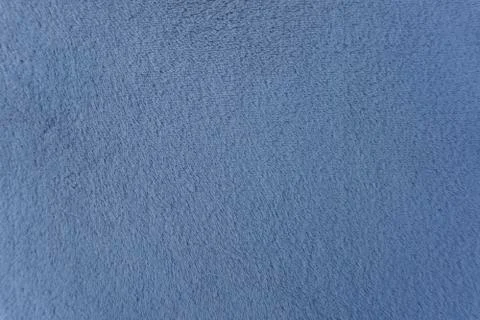 Plush texture from the blue towel Stock Photos