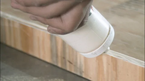 Plywood gluing process close up Stock Footage 122654020