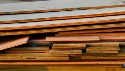 Plywood stack on edge Stock Photos