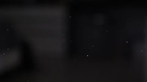 PM 2.5 and other dust in dark bedroom Stock Footage 102187116