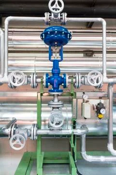 Pneumatic control valve in a steam heating system Stock Photos