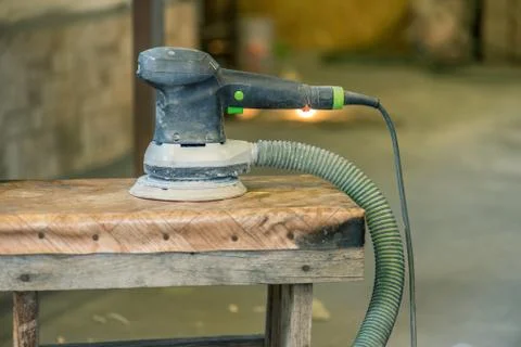 Pneumatic sander machine close up. Stock Photos