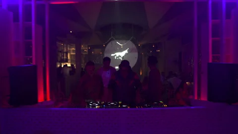 PNNY DJ Collective Performing Live in Neon Nightclub Cinematic 4K Video stock 329226502