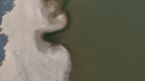 Po River drought with exposed sediment bank and critically low water level Stock Footage 346361831