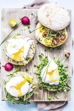 Poached egg in bread rolls recipe Stock Photos