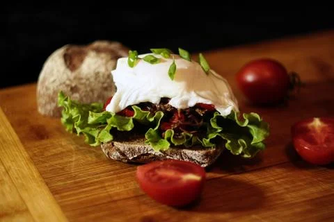 Poached egg lamb burger 库存照片