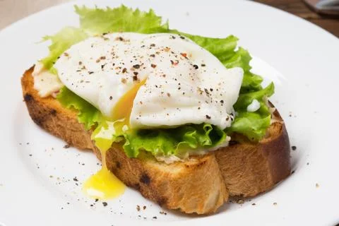 Poached egg Stock Photos