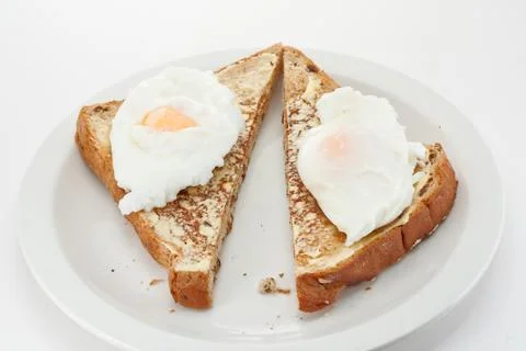 Poached egg on toast Stock Photos