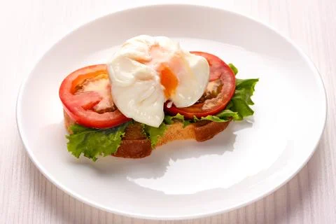 Poached egg on toast Stock Photos
