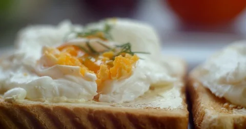 Poached eggs on toast closeup Stock Footage 87252351