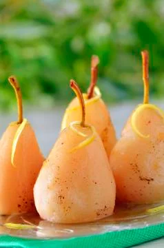 Poached pears in syrup Stock Photos