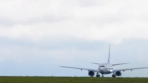 Pobeda Boeing 737-800 VP-BPS takeoff roll head on at Kazan Airport Stock Footage 346850291