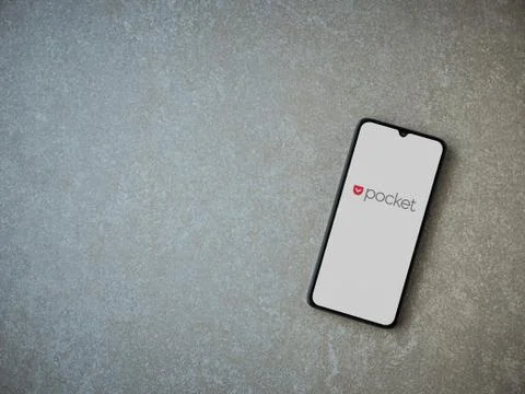 Pocket app launch screen with logo on the display of a black mobile smartphon Stock Photos