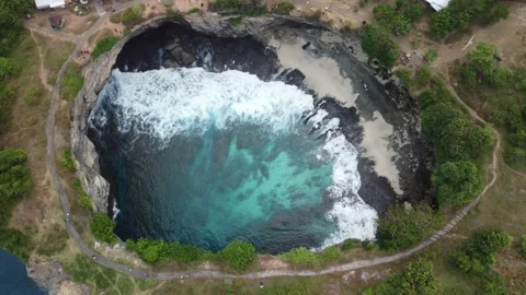 Pocket Beach Broken Beach bay Indonesia filmed from above V2 Stock-Footage 201948707