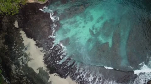 Pocket Beach Broken Beach bay Indonesia filmed from above Stock-Footage 201948727