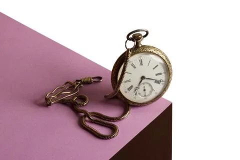 Pocket clock on the cube, optical illusion Stock Photos