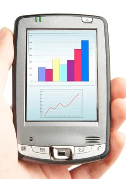 Pocket computer in a hand. Stock Photos