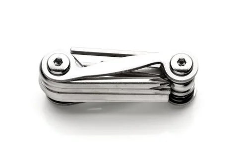 Pocket multifunctional tool, foldable screwdriver kit on white background Stock Photos