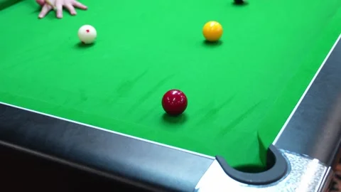 Pocket a red ball in blackball Pool game on a green cloth pool table Stock Footage 297777951