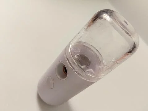 Pocket-Sized Hydration: Your On-the-Go Facial Mist Stock Photos