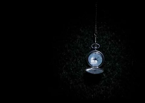 Pocket watch black background Stock Photos