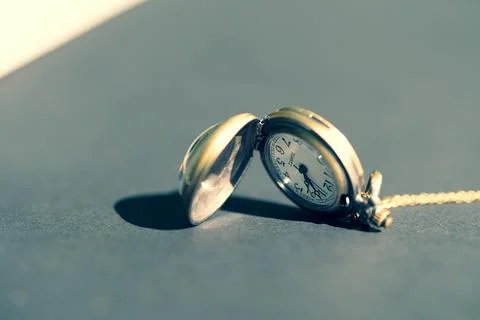 Pocket watch clock dial closeup. Selective Focus Stock Photos