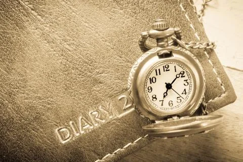 Pocket watch ,selective focus . Focus area are the dial of the clock,picture sty Stock Photos