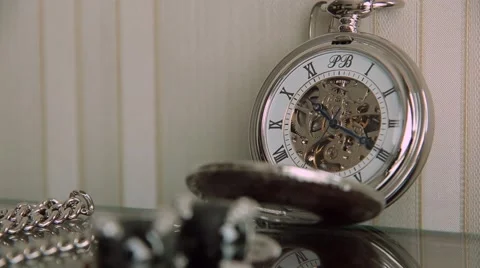 Pocket watch on table time lapse Stock Footage 59990431