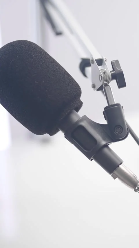 Podcast broadcast microphone on arm mount, white background Stock Footage 324973965