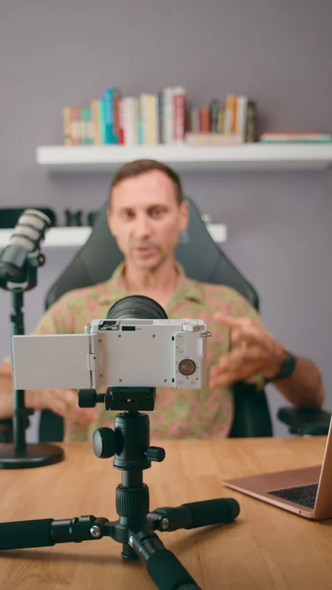 A podcast host is in the studio interacting and discussing various topics with Stockbeeldmateriaal 276341958