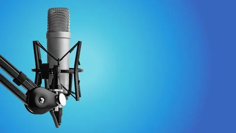 Podcast microphone on blue background ready for recording session Stock Photos
