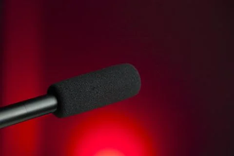 Podcast microphone on colored background with copy space. mic in studio. Micr Stock Photos