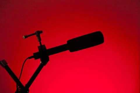Podcast microphone on colored background with copy space. mic in studio. Micr Stock Photos
