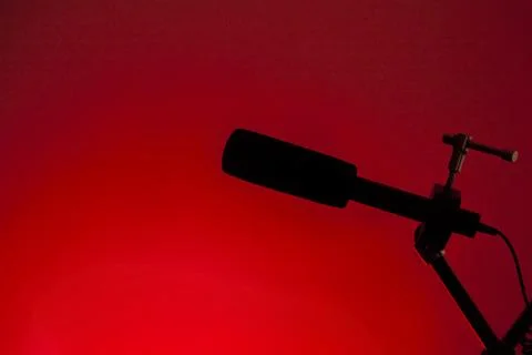 Podcast microphone on colored background with copy space. mic in studio. Micr Stock Photos