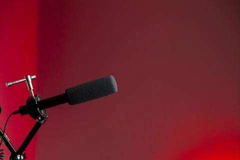 Podcast microphone on colored background with copy space. mic in studio. Micr Stock Photos