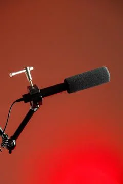 Podcast microphone on colored background with copy space. mic in studio. Micr Stock Photos