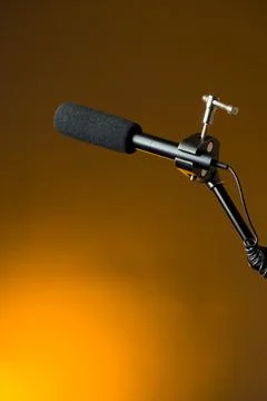 Podcast microphone on colored background with copy space. mic in studio. Micr Stock Photos