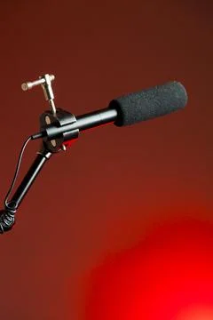 Podcast microphone on colored background with copy space. mic in studio. Micr Stock-Fotos