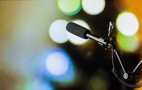 Podcast microphone on colored background with copy space. mic in studio. Micr Stock Photos