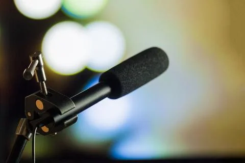 Podcast microphone on colored background with copy space. mic in studio. Micr Stock Photos