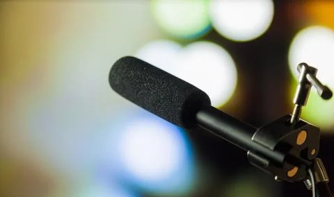 Podcast microphone on colored background with copy space. mic in studio. Micr Stock Photos