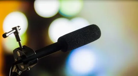 Podcast microphone on colored background with copy space. mic in studio. Micr Stock Photos