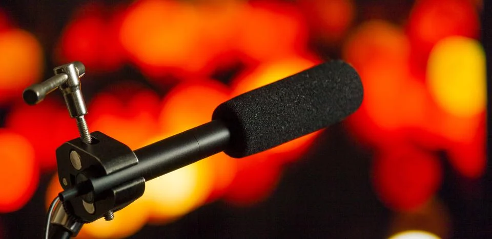 Podcast microphone on colored background with copy space. mic in studio. Micr Stock Photos