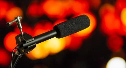 Podcast microphone on colored background with copy space. mic in studio. Micr Stock Photos