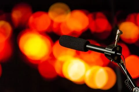 Podcast microphone on colored background with copy space. mic in studio. Micr Stock Photos