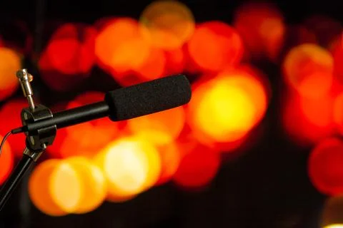 Podcast microphone on colored background with copy space. mic in studio. Micr Stock Photos