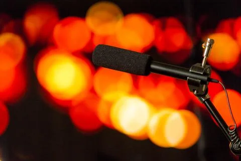 Podcast microphone on colored background with copy space. mic in studio. Micr 库存照片