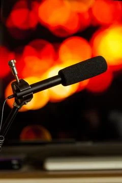 Podcast microphone on colored background with copy space. mic in studio. Micr Stock Photos